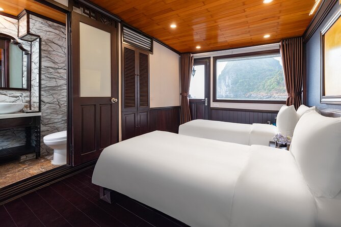 2-Day Boutique Cruise Discover Hidden Gems of Bai Tu Long Bay - Sunset party vibes and the comfort of sleeping on the water