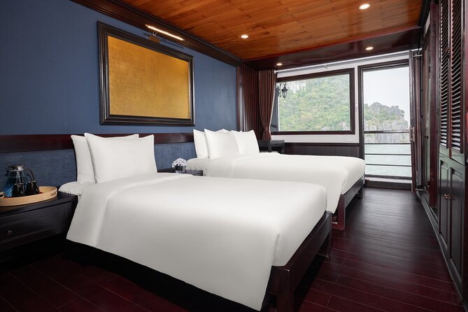 2-Day Boutique Cruise Discover Hidden Gems of Bai Tu Long Bay - Return cruise, lunch onboard, and getting back to Hanoi