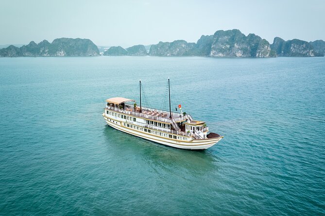 2-Day Boutique Cruise Discover Hidden Gems of Bai Tu Long Bay - Bai Tu Long Bay cruising, lunch, and kayaking in lagoons