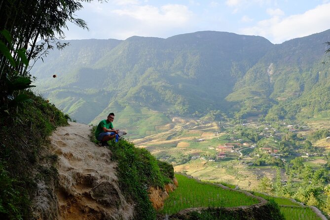 2D1N Buffalo trek by Hmong Sister House and Trekking - Day 2: rice fields at sunrise, Red Dao village stops, and a waterfall finish