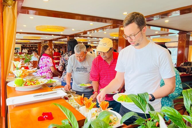 2D1N Ha Long Bay by Calypso Cruise, Caves, Meals, Transfer - Activities included: caves, bamboo boat time, kayaking, tai chi, and ship fun