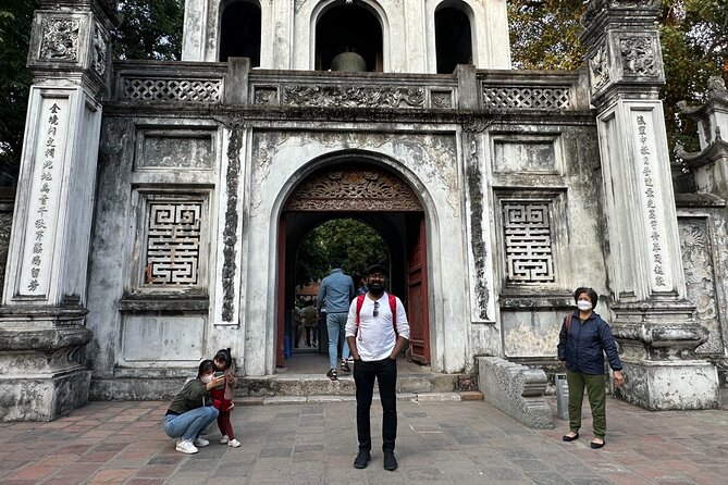 All-in-One Hanoi Walking Tour Through a Train Street - What the guide actually does for you on this walk