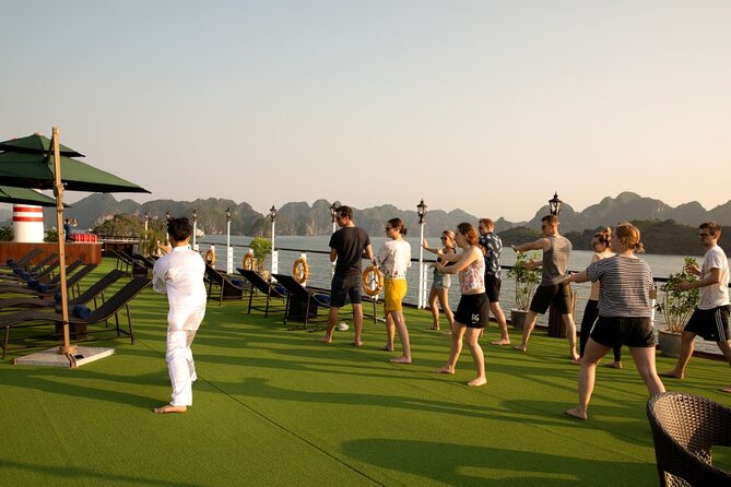 All-Inclusive 3 Day/2 Night Halong Luxury Cruise Meals, Cave, Kayaking, Swimming - Day 2: Tai chi, fishing village reality, caves, and Viet Hai cycling