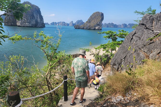 All-Inclusive 3 Day/2 Night Halong Luxury Cruise Meals, Cave, Kayaking, Swimming - Day 1: Welcome drink, Sung Sot Cave, Ti Top Island, and Dark and Bright