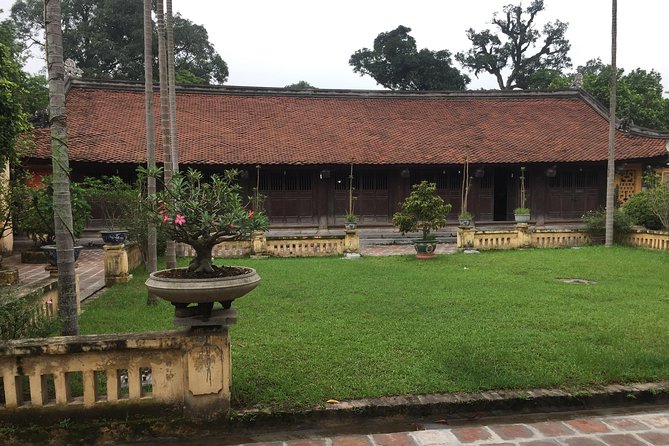 Ancient Village & The Legend of Co Loa Tour by E-Bike - Dong Ngac Ancient Village: Quiet Streets and Free-Admission Wonder