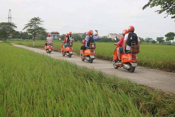 Beautiful Female Riders Vespa Red River Countryside Tour 5 Hours - Co Loa Citadel: history with a “you’re already there” feel