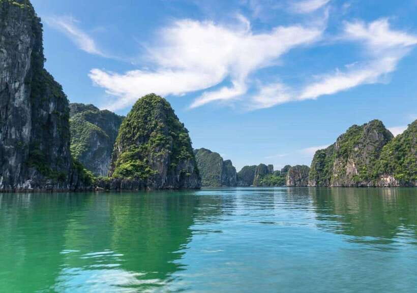 BEST Day Cruise Discover Untouched Beauty of Bai Tu Long Bay - The boutique Indochine-style boat, and why “up to 35 guests” matters