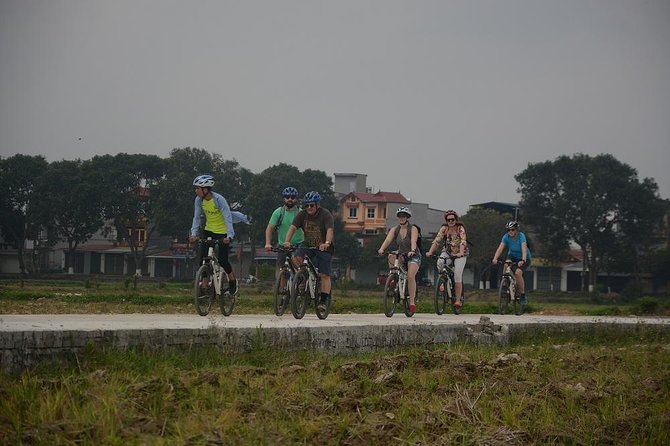 Bicycle Tours Hanoi: Full Day Bicycle Tours City & Countryside - Long Bien Bridge crossing: Hanoi from the Red River edge