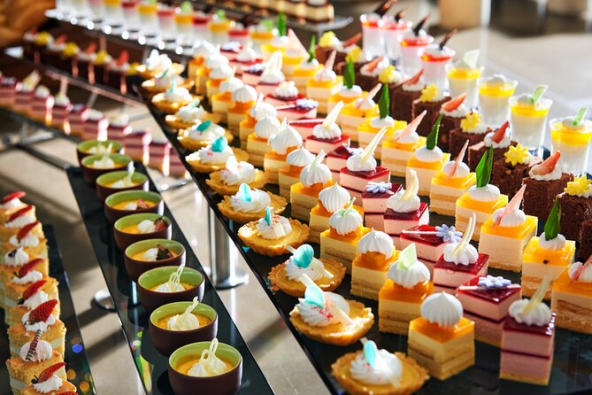 Buffet on Paradise Delight Dining Cruise Halong Bay Tour - Buffet dining cruise food: filling meal, plus canapés