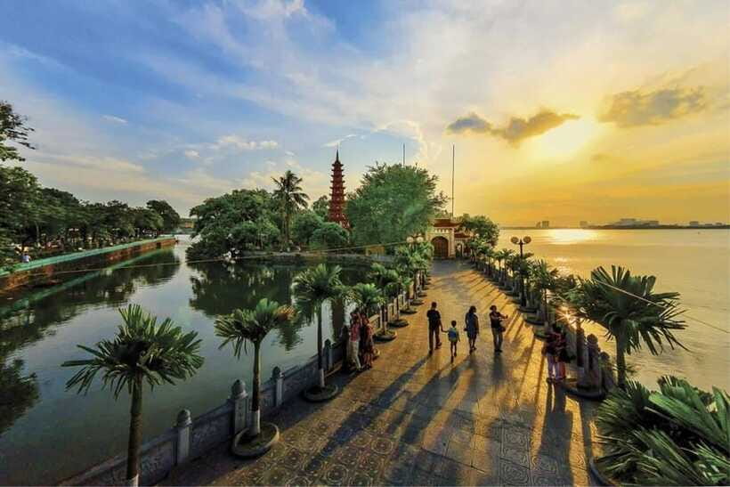 Cycling Through Hanoi: Old Quarter Pagodas & Red River Delta - West Lake calm and Tran Quoc Pagoda, a real tone shift