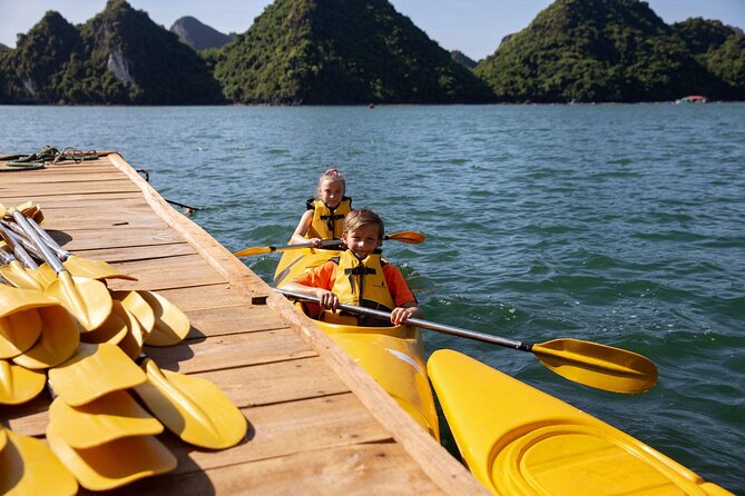 Discover Ha Long Bay in 2 Days and 1 Night Cruise Experience - Day 2: Tai Chi, Sunrise Views, Then Cave Stops