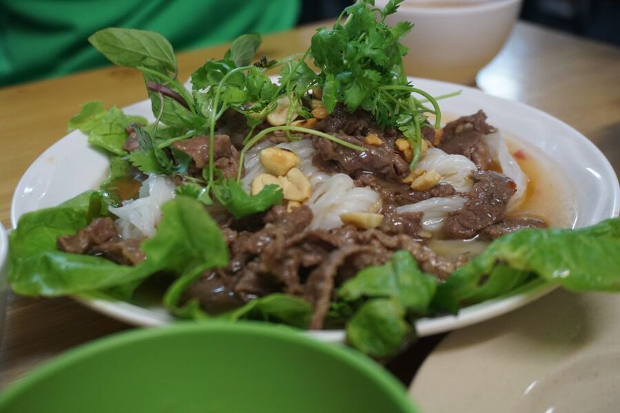 Enjoy Hanoi Like a Local - Vespa & Street Food Tour by Night - French Quarter Night Architecture and Opera House Views