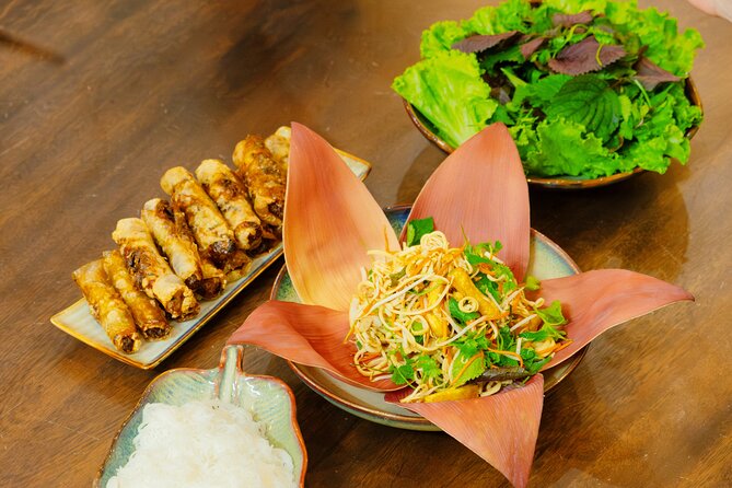 Experience Hanoi Cooking Class with Free Wine Tasting - Entering the class at Đồng Xuân Market