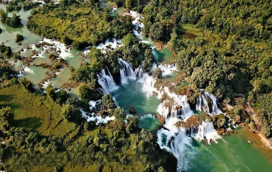 From Hanoi: 2-Day Ban Gioc Waterfall Tour - Small Group - Day 1: the Ban Gioc Waterfall window, plus a cave that changes the mood