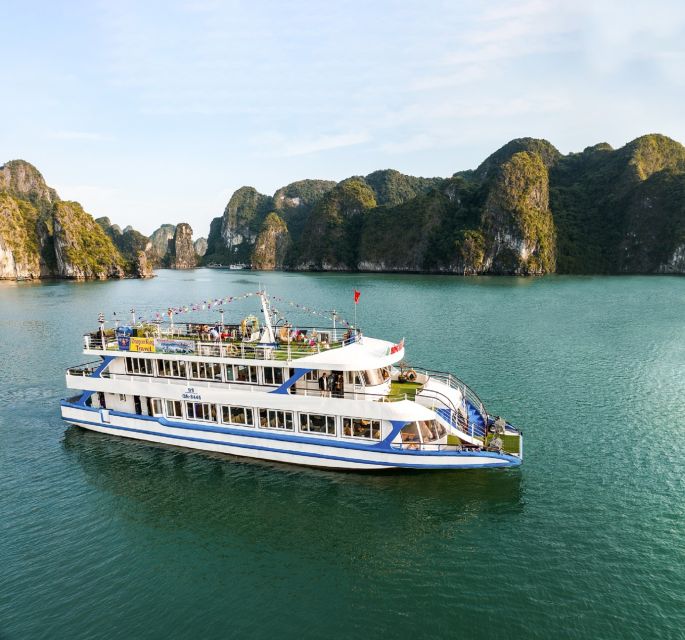 From Hanoi: 2-Day Ninh Binh Tour with Ha Long Bay Cruise - Day 2: Halong Bay Caves, Kayaking, Titop Island, and Sunset Party Energy