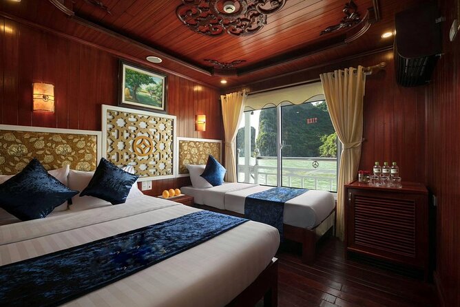 From Hanoi: 2D1N Ha Long Bay Deluxe Cruise with Bus Limousine - What Deluxe Adds Here: Private Bathroom, Meals, and Included Fees