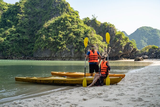 From Hanoi: 2D1N Ha Long Bay Deluxe Cruise with Bus Limousine - Day 2 Morning: Tai Chi, Sung Sot Cave, and the Ha Long Bay Wake-Up Feel
