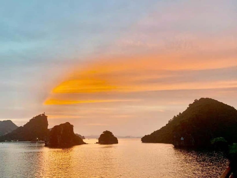 From Hanoi : 4-day Ninh Binh-Halong Bay Cruise with Balcony - Day 3: Ninh Binh to Halong Bay cruise, Tuan Chau check-in, Titop, and sunset on the sundeck