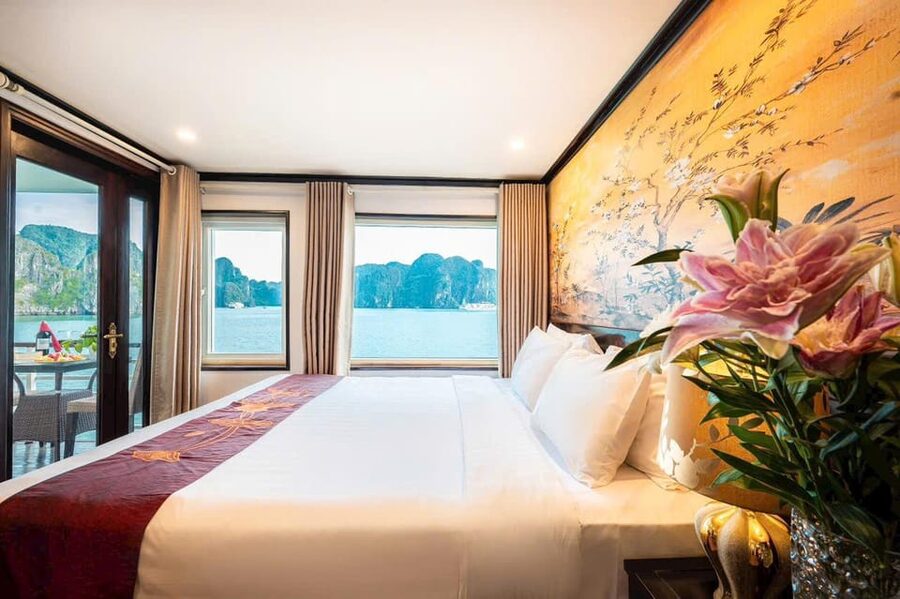 From Hanoi : 4-day Ninh Binh-Halong Bay Cruise with Balcony - On-water activities: kayaking, bamboo boats, cooking, Tai Chi, and squid fishing