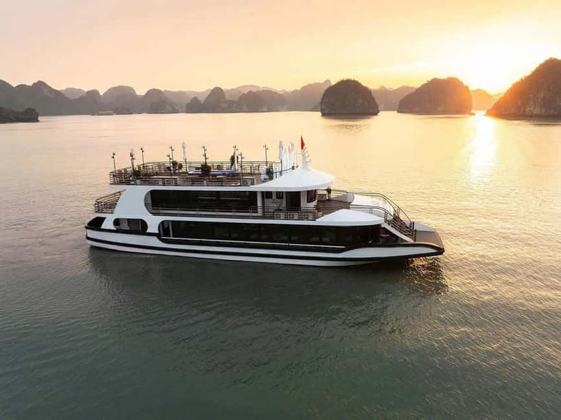 From Hanoi:Ha Long Bay Day Tour w/ Thien Cung Cave& Kayaking - Cruising Ha Long Bay: karst scenery and the Dog Stone photo moment