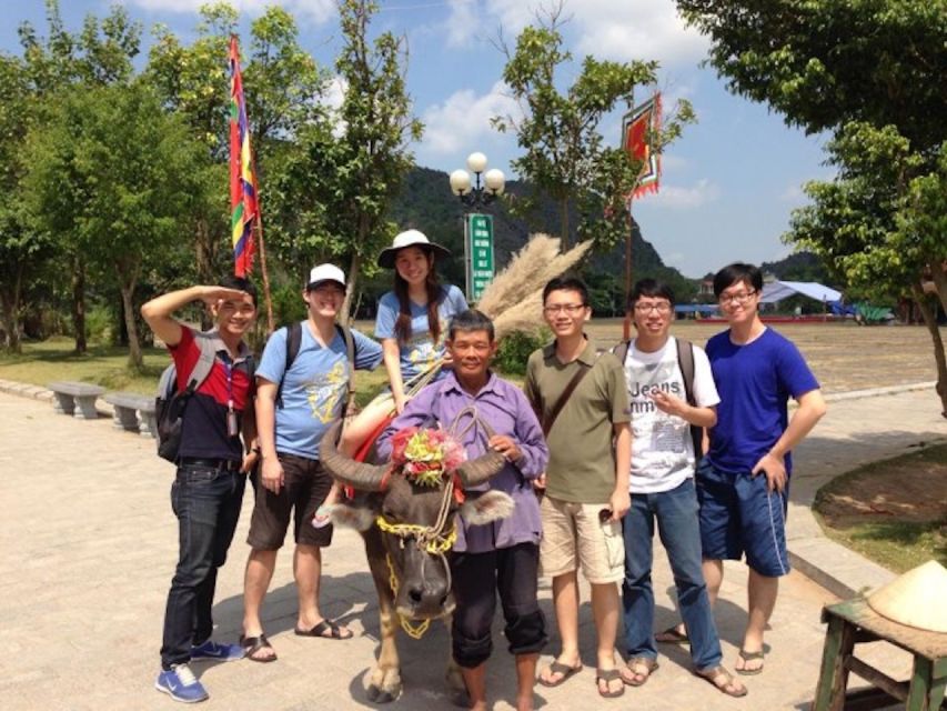 From Hanoi: Hoa Lu, Hang Mua Hike, Tam Coc Boat, and Lunch - The Tam Coc sampan ride: caves, karst, and slow river scenery