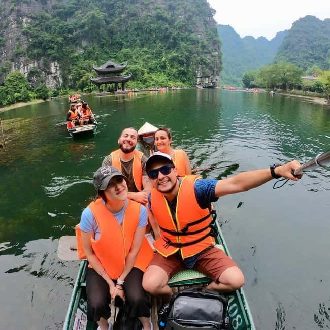 From Hanoi: Ninh Binh Trip with Cycling & Buffet Lunch - Trang An Boat Tour: Caves, Limestone, and a UNESCO World Heritage Feel