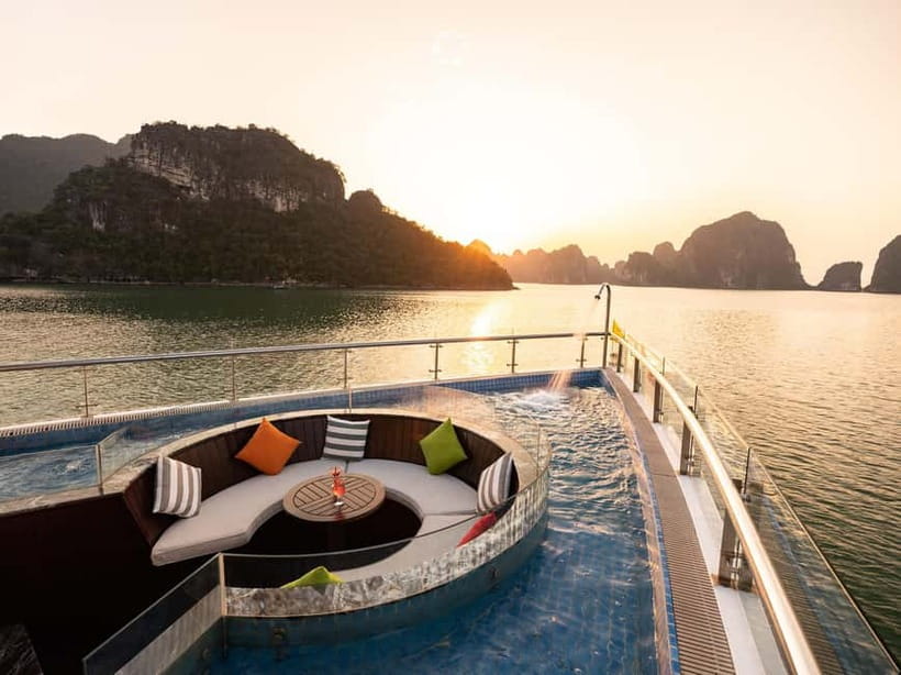 From Hanoi: Top-Rated Ha Long Bay Day Cruise with Jade Sails - Dark and Bright Cave at 12:45 PM: kayak or bamboo boat choice