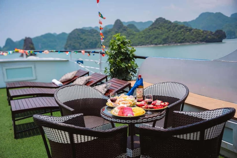 From Ninh Binh: Ha Long Bay 1-Day Trip Ending in Hanoi - Titop Island and the Tip Top climb: best views, shortest time