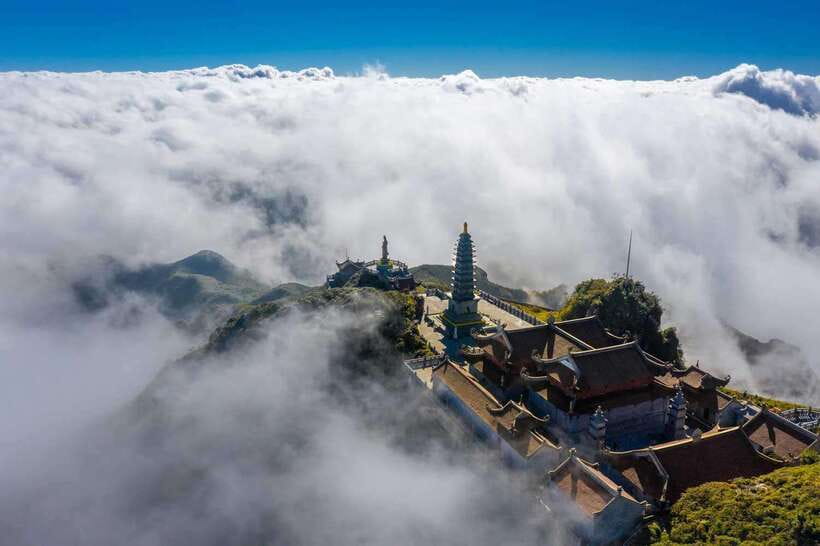From Sapa:Cable Car Ticket To Fansipan Legend & Car Transfer - 9 Storey Waterfall and pacing on a cold, altitude day