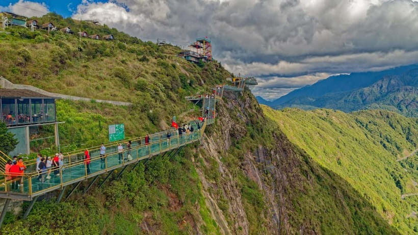 From Sapa: Glass Bridge and Silver Waterfall Group Tour - The glass elevator and the moment you step onto the bridge