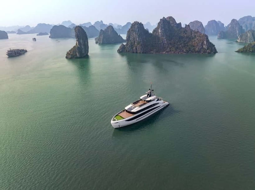 Full Day: Fabulous Halong Bay Tour with Taliya Cruise 5<em> – Key highlights to know before you go’ /></p>
<ul>
<li><strong>Dark and Bright cave by bamboo boat</strong> for a short, easy 45-minute slot</li>
<li><strong>Lan Ha Bay versus the more crowded feel</strong> of some Halong routes</li>
<li><strong>Ao Ech kayaking and swimming</strong> in clear water with limestone scenery all around</li>
<li><strong>Lunch plus afternoon tea and Vietnamese spring rolls</strong> included in the price</li>
<li><strong>Sunset party on the sundeck</strong> with time to relax and mingle</li>
</ul>
<h2>From Hanoi pickup to Tuan Chau Marina, here is the real pacing</h2>
<p><img width="820" height="614" decoding="async" src=