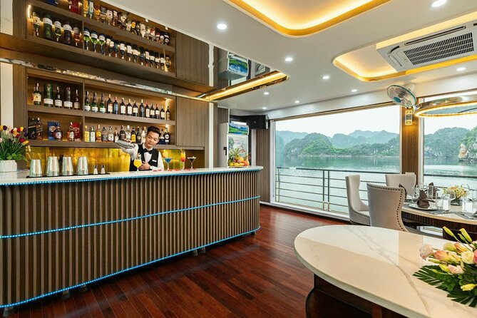 Full day Halong Bay Luxury Cruise - buffet lunch, kayak, swim. - Ti Top Island: swim, beach time, or a 500-step viewpoint quest