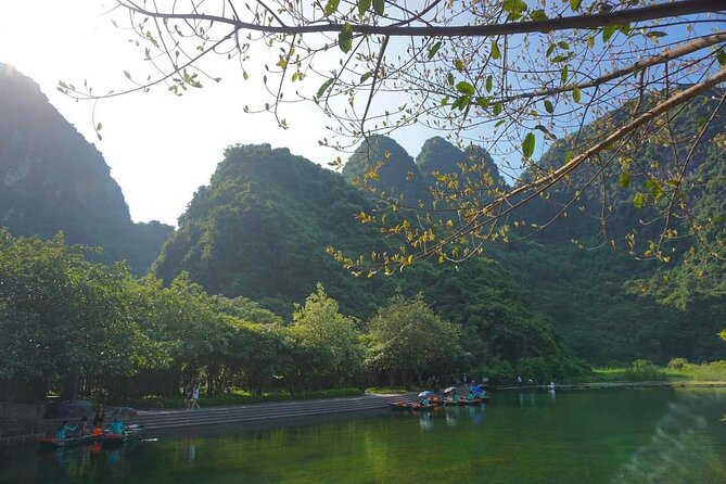 Full-Day Ninh Binh Tour from HaNoi with transfer - Tam Coc bamboo boat, caves, and mountain-top scenery