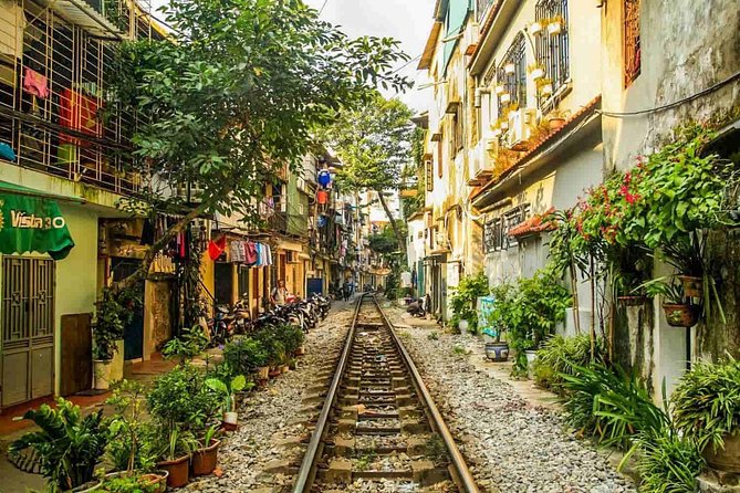 Full-day Private Hanoi Sightseeing Tailored on request - Train Street stop, Hoa Lo Prison choice, and lunch at Blue Butterfly