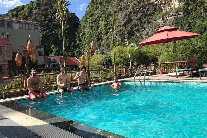 Full-Day Tour Hoa Lu, Tam Coc Boat Trip and Mua Cave - Mua Cave and the nearly 500-step climb to Lying Dragon Mountain