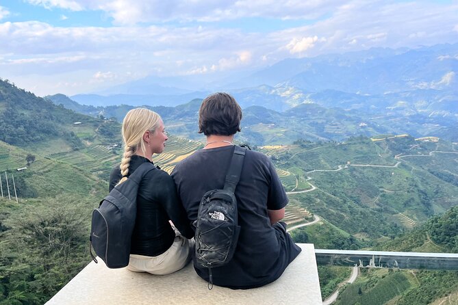 Ha Giang Loop 3 Days from Hanoi by Ha Giang Expeditions - Day 2: Ma Pi Leng Pass Ridge Views, Nho Que River Boat Time, and Meo Vac Market Energy
