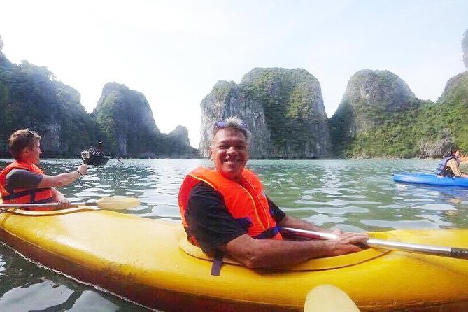 Ha Long Bay 2D1N on a 3-Star Cruise - Day 2: Tai Chi and Hang Luon Cave lagoon by kayak or bamboo boat