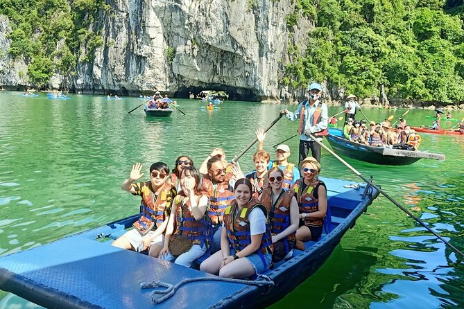 Ha Long Bay Cruise Day Tour-best selling: Included transportation - Hang Luon Cave lagoon time: kayaking or bamboo boat
