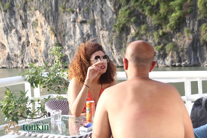 Ha Long Bay Cruise Day Tour with lunch, kayaking, surprise cave & titop island - Surprise Cave and the Cave System Stop, Cool Air and Crowds