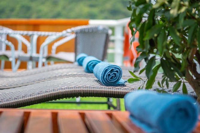 Ha Long Bay Cruise Day Tour with lunch, kayaking, surprise cave & titop island - Kayaking and Swimming Optional Add-Ons, How to Decide