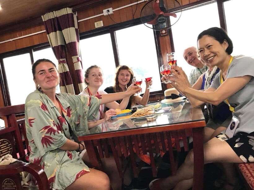 Ha Long Bay Small Deluxe Cruise Day Trip With Kayak & Lunch - Titop Island at 15h00: beach time and a climb to Titop Peak
