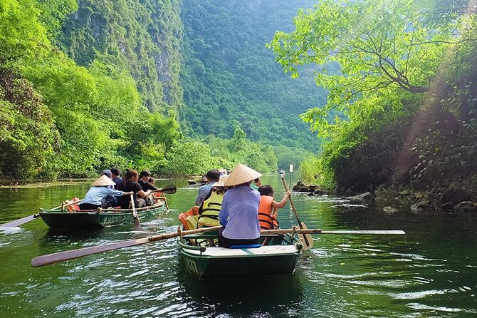Ha Noi_Ninh Binh Tour Full Day_Mua Cave - Tam Coc - Hoa Lu - Tam Coc-Bich Dộng boat cruise through the limestone karst