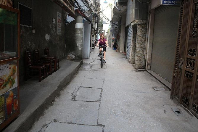 Half-Day Bicycle Tour Combine City & Countryside + Train Street - West Lake cycling and the Thanh Niên contrast stop