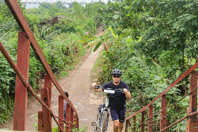 Half Day Ha Noi Tour by E-bike - West Lake ride: your confidence test, in a good way