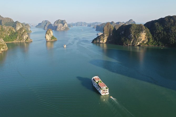 Halong Bay 2 Days 1 Night Included Transfer from Hanoi - Day 2 starts early: sunrise exercise, breakfast, and kayaking