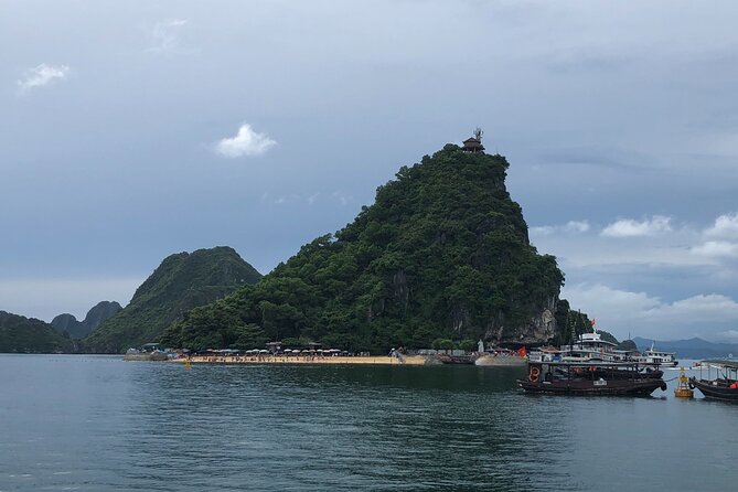 Halong Bay Cruise With Cave, Kayaking, Swimming - Buffet Lunch - Hang Luon Cave lagoon time: kayaking by yourself or going local on bamboo