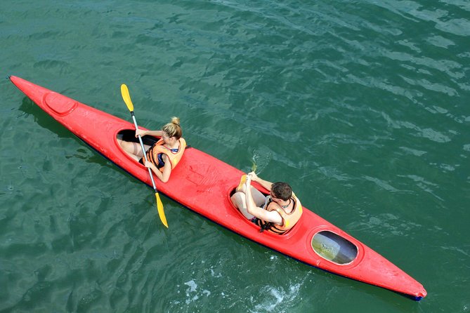 Halong Bay Day Tour: 4 hour cruising, caving, kayaking & lunch - Kayaking and Small Bamboo Boat Through Tunnel Areas