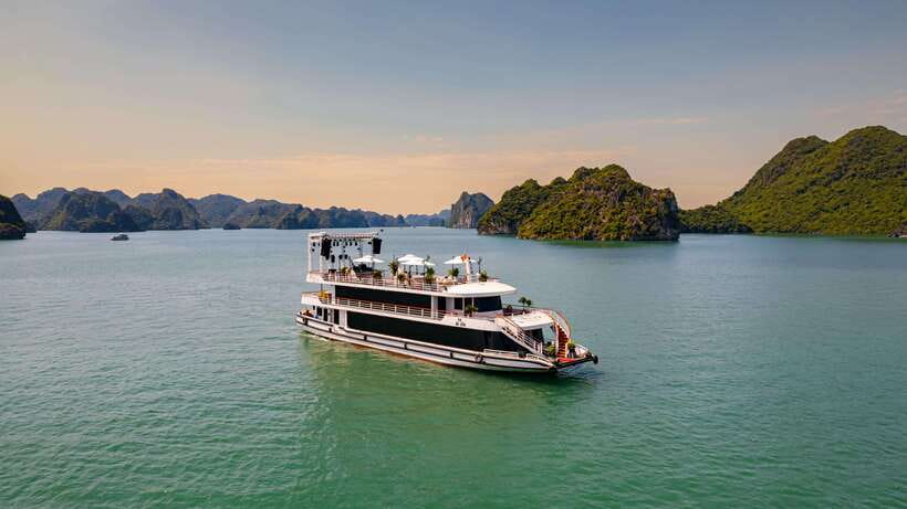 Halong bay day tour: Best seller IRIS CRUISE with live band - Hanoi Pickup and the Shared Transfer Reality (Plan Your Day Around It)
