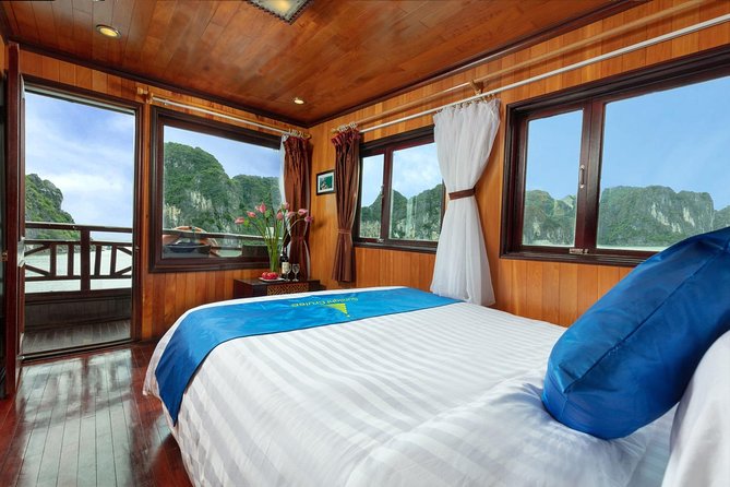 Halong bay deluxe cruise 2 days/ 1 night: kayaking, titop island, surprise cave - From Hanoi to the harbor, pickup options that save hassle