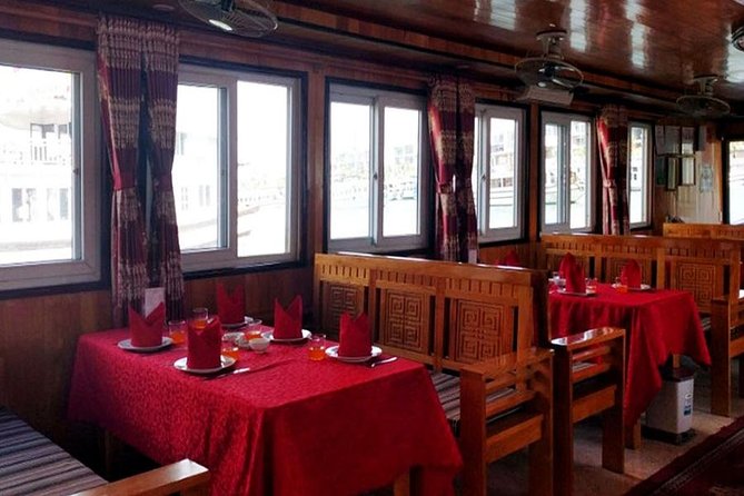 Halong Bay Full Day Tour with All-Inclusive: Boat, Kayak, Island, Cave and Lunch - Surprising Cave and tunnel stops: what to expect underground